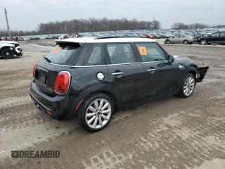 2021 MINI Hardtop 4 Door Cooper S с VIN WMWXU9C04M2M96933, выставлен на аукционе Copart как лот 80886524 с пробегом 60 746 миль миль и Списание • Salvage title. История ставок и продаж доступна на DreamBid. Изображение 3.