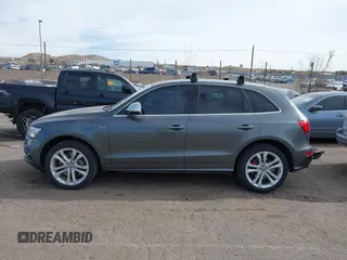 2015 Audi SQ5 Premium Plus with VIN WA1CGAFP3FA056627, listed as a IAAI auction lot 41129651 with 142,407 mi miles. Bid and sale history available at carsss.com. Image 14.