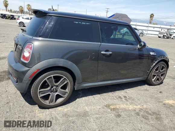 2012 MINI Hardtop S with VIN WMWSV3C53CTY29714, listed as a Copart auction lot 52370175 with 94,536 mi miles and Salvage title. Bid and sale history available at DreamBid. Image 3.