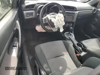 2014 Scion tC z VIN JTKJF5C76E3070903, wystawiony jako Copart lot #54953665 z przebiegiem 77 850 mil mil oraz Szkody całkowita. Historia ofert i sprzedaży dostępna na DreamBid. Obrazek 8.