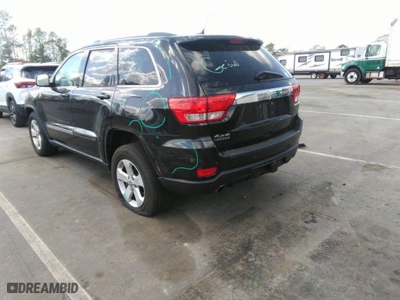 2011 Jeep Grand Cherokee Laredo with VIN 1J4RR4GTXBC538060, listed as a IAAI auction lot 41964694 with 152,999 mi miles. Bid and sale history available at carsss.com. Image 3.