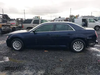 2012 Chrysler 300 with VIN 2C3CCAAG7CH142422, listed as a IAAI auction lot 41555202 with 134,864 mi miles and . Bid and sale history available at DreamBid. Image 14.