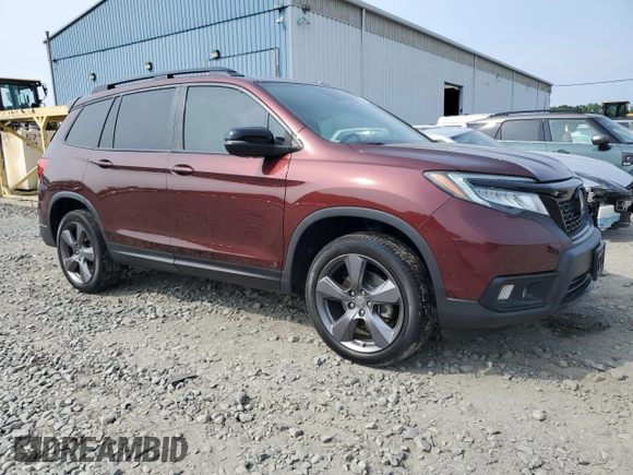2019 Honda Passport Touring with VIN 5FNYF8H9XKB026631, listed as a Copart auction lot 61037545 with 54,041 mi miles and Salvage title. Bid and sale history available at DreamBid. Image 4.