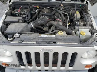 2007 Jeep Wrangler Unlimited Rubicon с VIN 1J8GA691X7L191115, выставлен на аукционе Copart как лот 87523925 с пробегом 85 709 миль миль и Списание • Salvage title. История ставок и продаж доступна на DreamBid. Изображение 12.