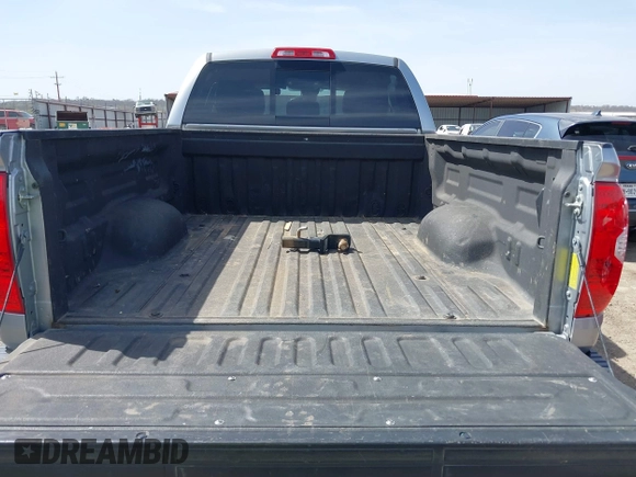 2018 Toyota Tundra 2WD SR with VIN 5TFRM5F16JX133735, listed as a IAAI auction lot 41818455 with 148,456 mi miles. Bid and sale history available at carsss.com. Image 17.