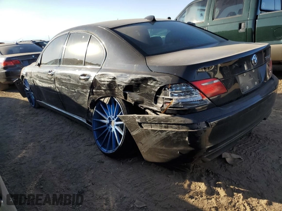 2007 BMW 7 Series 750i with VIN WBAHL83507DT07958, listed as a Copart auction lot 73318944 with 127,698 mi miles and Salvage Title. Bid and sale history available at DreamBid. Image 2.
