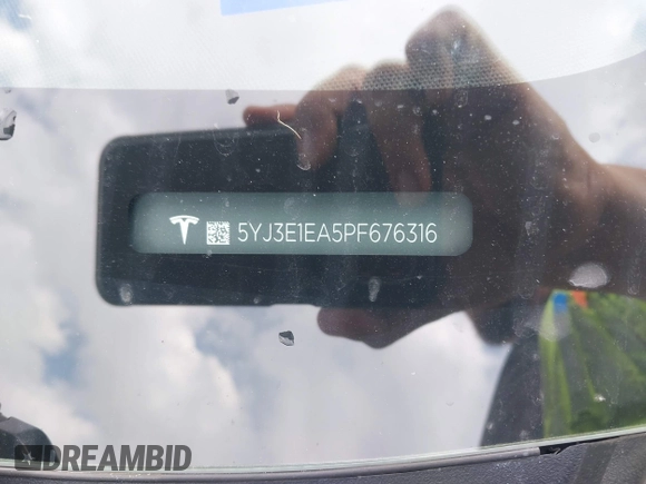 2023 Tesla Model 3 with VIN 5YJ3E1EA5PF676316, listed as a IAAI auction lot 42384765 with 33,715 mi miles and . Bid and sale history available at DreamBid. Image 9.