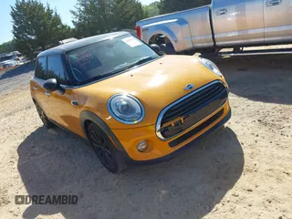 2016 MINI Hardtop 4 Door with VIN WMWXU1C58G2D08712, listed as a IAAI auction lot 42038278 with 96,874 mi miles and . Bid and sale history available at DreamBid. Image 1.