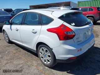 2012 Ford Focus SE with VIN 1FAHP3K25CL122733, listed as a IAAI auction lot 41836880 with 125,439 mi miles. Bid and sale history available at carsss.com. Image 3.
