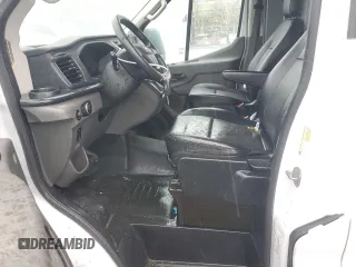 2021 Ford Transit Cargo with VIN 1FTBR1X84MKA38597, listed as a Copart auction lot 71813334 with 141,505 mi miles and Clean Title. Bid and sale history available at DreamBid. Image 7.