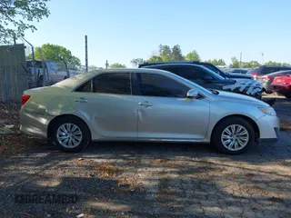 2013 Toyota Camry L with VIN 4T4BF1FK9DR317734, listed as a IAAI auction lot 42060073 with 202,480 mi miles. Bid and sale history available at carsss.com. Image 13.