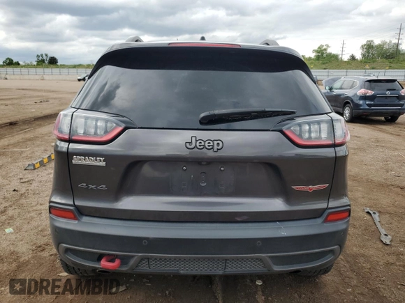 2020 Jeep Cherokee Trailhawk with VIN 1C4PJMBXXLD500953, listed as a Copart auction lot 58761405 with 68,457 mi miles and Salvage title. Bid and sale history available at DreamBid. Image 6.