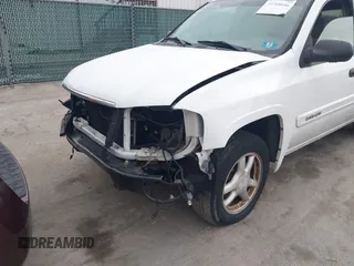 2005 GMC Envoy SLT with VIN 1GKDT13S952190876, listed as a IAAI auction lot 41308686 with 244,774 mi miles. Bid and sale history available at carsss.com. Image 6.