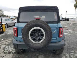 2021 Ford Bronco with VIN 1FMEE5DP4MLA90474, listed as a Copart auction lot 42542495 with 26,674 mi miles and Salvage Title. Bid and sale history available at DreamBid. Image 6.