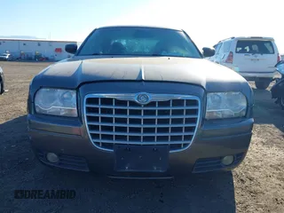 2008 Chrysler 300 LX with VIN 2C3KA43RX8H172037, listed as a IAAI auction lot 41429004 with 194,201 mi miles. Bid and sale history available at carsss.com. Image 6.