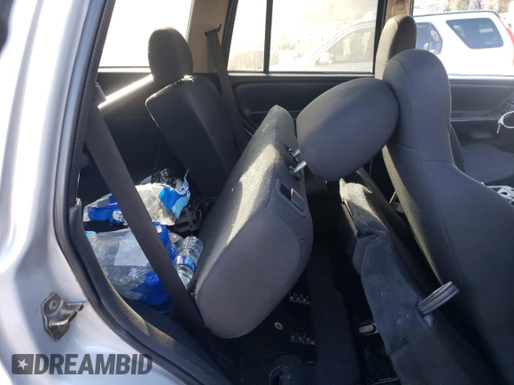 2003 Jeep Grand Cherokee Laredo with VIN 1J4GX48S63C523513, listed as a Copart auction lot 50001005 with 0 mi miles and Salvage Title. Bid and sale history available at carsss.com. Image 10.