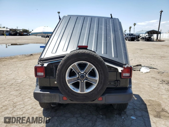 2020 Jeep Wrangler Unlimited Sahara z VIN 1C4HJXEN2LW213644, wystawiony jako Copart lot #54935355 z przebiegiem 76 268 mil mil oraz Szkoda całkowita • Salvage title. Historia ofert i sprzedaży dostępna na DreamBid. Obrazek 6.