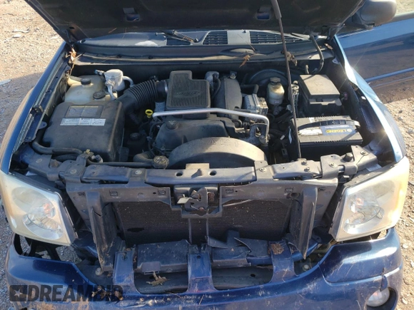 2005 GMC Envoy SLE with VIN 1GKDS13S352369384, listed as a Copart auction lot 79996394 with 117,697 mi miles and Salvage Title. Bid and sale history available at carsss.com. Image 13.