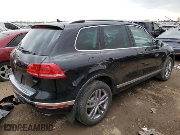 2016 Volkswagen Touareg Sport with VIN WVGEF9BP4GD011455, listed as a Copart auction lot 49734885 with 145,450 mi miles and Salvage Title. Bid and sale history available at DreamBid. Image 3.
