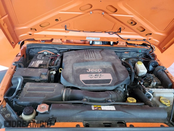 2013 Jeep Wrangler Unlimited Sport with VIN 1C4BJWDG7DL557119, listed as a Copart auction lot 63186715 with 86,241 mi miles and Salvage title. Bid and sale history available at DreamBid. Image 12.