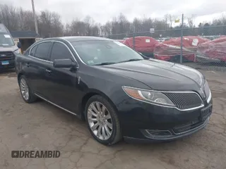 2013 Lincoln MKS with VIN 1LNHL9DK5DG600788, listed as a IAAI auction lot 42036534 with 325,751 mi miles. Bid and sale history available at carsss.com. Image 1.