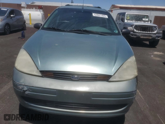 2004 Ford Focus SE with VIN 1FAFP36384W191801, listed as a Copart auction lot 63661465 with 144,226 mi miles and Salvage title. Bid and sale history available at DreamBid. Image 5.