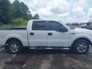 2007 Ford F-150 XLT z VIN 1FTRW12W67FB50327, wystawiony jako IAAI lot #42400863 z przebiegiem 231 181 mil mil oraz . Historia ofert i sprzedaży dostępna na DreamBid. Obrazek 13.