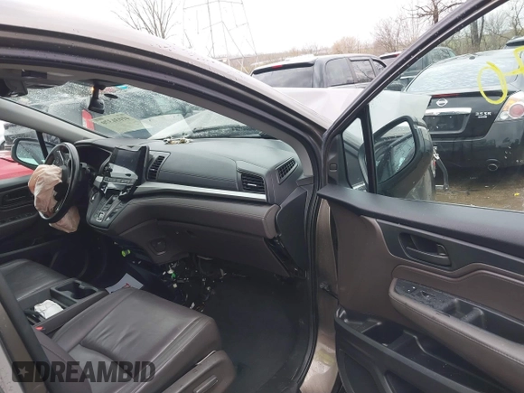 2018 Honda Odyssey EX-L with VIN 5FNRL6H72JB081086, listed as a IAAI auction lot 41031370 with 73,907 mi miles and . Bid and sale history available at DreamBid. Image 5.