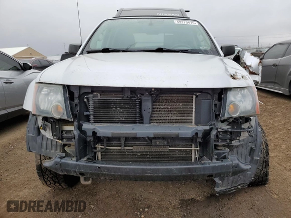 2014 Nissan Xterra X with VIN 5N1AN0NW1EN801139, listed as a Copart auction lot 49270475 with 117,619 mi miles and Salvage Title. Bid and sale history available at DreamBid. Image 5.