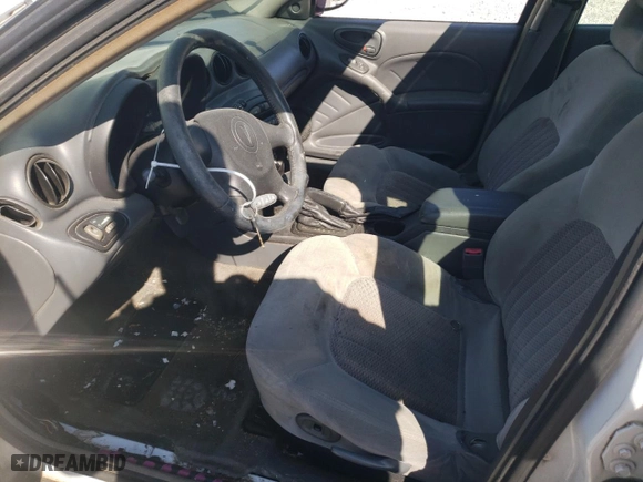 2004 Pontiac Grand Am GT with VIN 1G2NW52E74C189023, listed as a Copart auction lot 78256904 with 209,706 mi miles and Salvage Title. Bid and sale history available at carsss.com. Image 7.