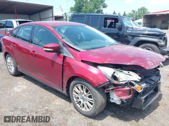 2013 Ford Focus SE z VIN 1FADP3F26DL242146, wystawiony jako IAAI lot #42679877 z przebiegiem 207 908 mil mil oraz . Historia ofert i sprzedaży dostępna na DreamBid. Obrazek 1.