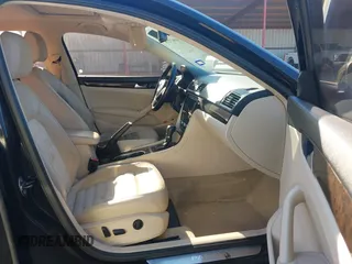 2014 Volkswagen Passat SEL Premium with VIN 1VWCS7A39EC080409, listed as a IAAI auction lot 40917278 with 140,783 mi miles. Bid and sale history available at carsss.com. Image 5.