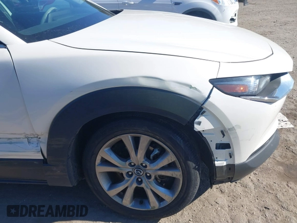 2021 Mazda CX-30 Select with VIN 3MVDMABL3MM239692, listed as a IAAI auction lot 41354738 with 48,928 mi miles and . Bid and sale history available at DreamBid. Image 12.