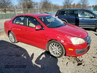 2008 Volkswagen Jetta Wolfsburg Edition z VIN 3VWRJ71K48M127241, wystawiony jako Copart lot #83201434 z przebiegiem 158 145 mil mil oraz Szkoda całkowita • Salvage title. Historia ofert i sprzedaży dostępna na DreamBid. Obrazek 4.