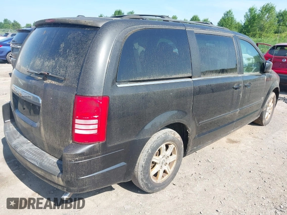 2008 Chrysler Town & Country Touring with VIN 2A8HR54P48R736561, listed as a IAAI auction lot 42562758 with 187,852 mi miles and . Bid and sale history available at DreamBid. Image 4.