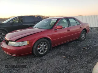 2003 Cadillac Seville Luxury SLS z VIN 1G6KS54Y63U182528, wystawiony jako Copart lot #84739294 z przebiegiem 73 802 mil mil oraz Czysty tytuł • Clean title. Historia ofert i sprzedaży dostępna na DreamBid. Obrazek 1.
