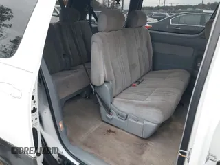 2000 Toyota Sienna CE z VIN 4T3ZF19C4YU209032, wystawiony jako IAAI lot #41067172 z przebiegiem 242 380 mil mil oraz . Historia ofert i sprzedaży dostępna na DreamBid. Obrazek 8.