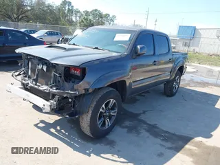 2010 Toyota Tacoma PreRunner with VIN 3TMJU4GNXAM099667, listed as a IAAI auction lot 41530993 with 201,375 mi miles and . Bid and sale history available at DreamBid. Image 2.