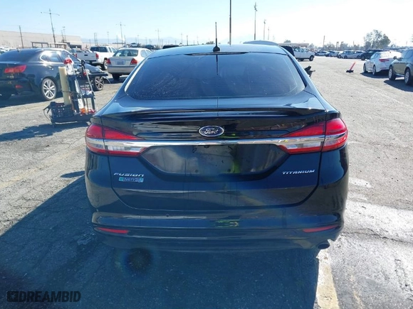 2017 Ford Fusion Energi Titanium with VIN 3FA6P0SU1HR116976, listed as a IAAI auction lot 39028290 with 86,678 mi miles. Bid and sale history available at carsss.com. Image 16.