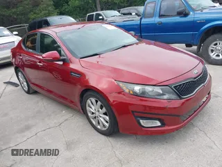 2014 Kia Optima EX z VIN 5XXGN4A71EG284280, wystawiony jako IAAI lot #42278795 z przebiegiem 179 200 mil mil oraz . Historia ofert i sprzedaży dostępna na DreamBid. Obrazek 1.