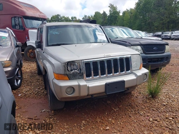 2007 Jeep Commander Sport z VIN 1J8HG48P47C672667, wystawiony jako IAAI lot #40423450 z przebiegiem 230 823 mil mil oraz . Historia ofert i sprzedaży dostępna na DreamBid. Obrazek 1.