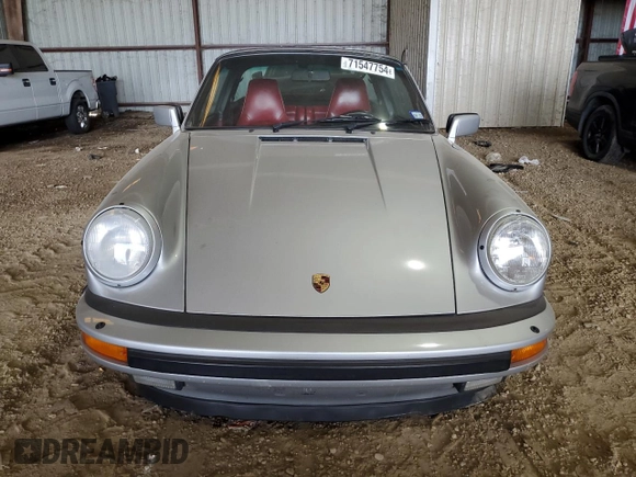 1988 Porsche 911 z VIN WP0EB0913JS161203, wystawiony jako Copart lot #71547754 z przebiegiem 109 128 mil mil oraz Szkoda całkowita • Salvage title. Historia ofert i sprzedaży dostępna na DreamBid. Obrazek 5.