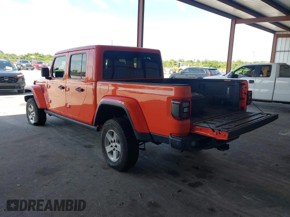 2020 Jeep Gladiator Overland z VIN 1C6HJTFG4LL154369, wystawiony jako IAAI lot #42681844 z przebiegiem 76 374 mil mil oraz . Historia ofert i sprzedaży dostępna na DreamBid. Obrazek 3.