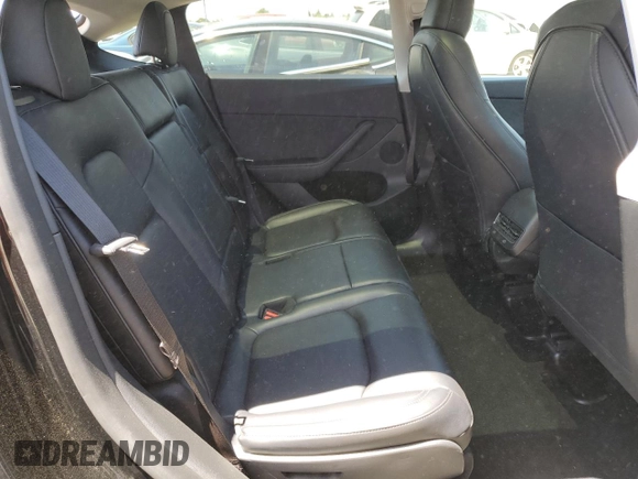 2024 Tesla Model Y Long Range with VIN 7SAYGAEE9RF125458, listed as a Copart auction lot 59567365 with 28,966 mi miles and Salvage title. Bid and sale history available at DreamBid. Image 11.