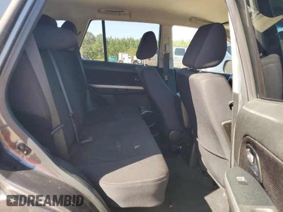 2012 Suzuki Grand Vitara Premium z VIN JS3TD0D23C4100721, wystawiony jako Copart lot #53086955 z przebiegiem 99 951 mil mil oraz Szkoda całkowita • Salvage title. Historia ofert i sprzedaży dostępna na DreamBid. Obrazek 11.