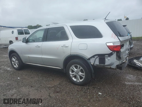 2012 Dodge Durango SXT with VIN 1C4RDJAG4CC106273, listed as a Copart auction lot 59767205 with 223,098 mi miles and Salvage title. Bid and sale history available at DreamBid. Image 2.
