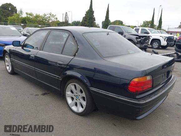 1998 BMW 7 Series with VIN WBAGF8323WDL57406, listed as a IAAI auction lot 42428227 with 93,448 mi miles and . Bid and sale history available at DreamBid. Image 3.