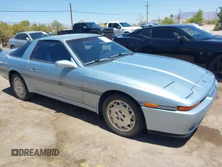 1989 Toyota Supra z VIN JT2MA71J7K0107654, wystawiony jako IAAI lot #42078617 z przebiegiem 181 176 mil mil oraz . Historia ofert i sprzedaży dostępna na DreamBid. Obrazek 1.