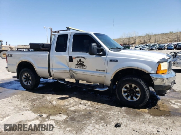 2001 Ford F-250 XL with VIN 1FTNX21F11ED05348, listed as a Copart auction lot 52098155 with 217,678 mi miles and Salvage Title. Bid and sale history available at DreamBid. Image 4.