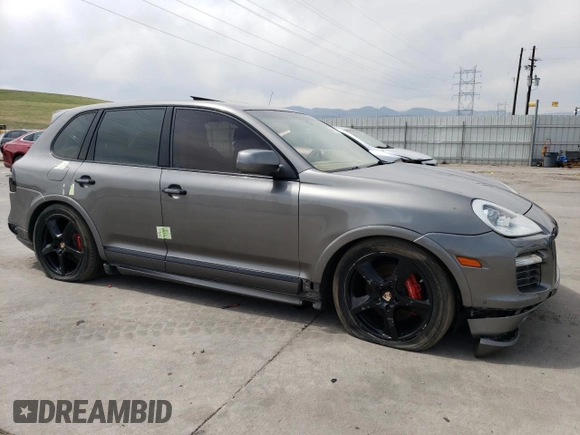 2009 Porsche Cayenne GTS z VIN WP1AD29P19LA62893, wystawiony jako Copart lot #54410625 z przebiegiem 113 366 mil mil oraz Szkody całkowita. Historia ofert i sprzedaży dostępna na DreamBid. Obrazek 4.